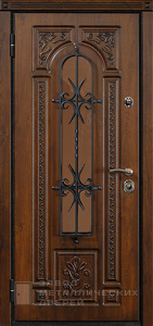 Фото «Дверь с ковкой №7»  в Москве