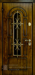 Фото «Дверь с ковкой №11»  в Москве