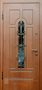 Фото «Дверь с ковкой №19»  в Москве